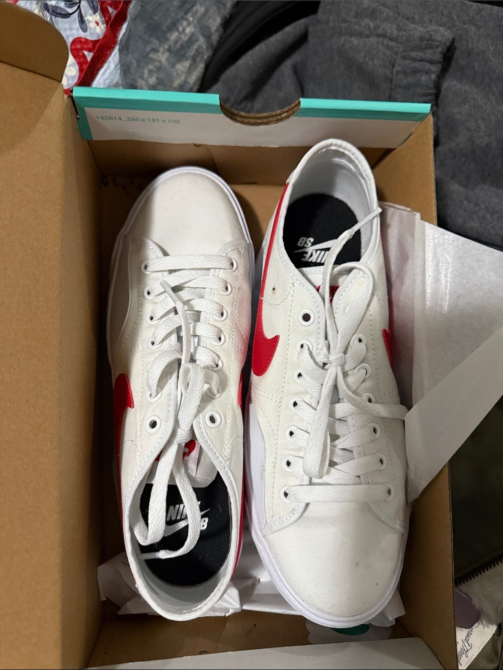 White Canvas Sneakers with Red Swoosh - women’s